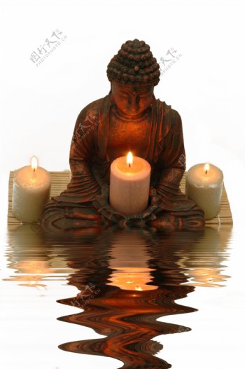 蜡烛与佛像图片