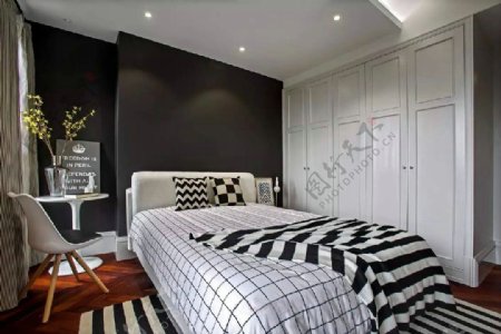 现代时尚卧室条纹地毯室内装修效果图