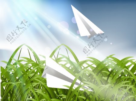 矢量素材草丛上的纸飞机