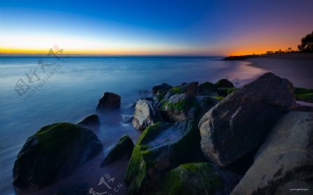 海水天空岩石夕阳