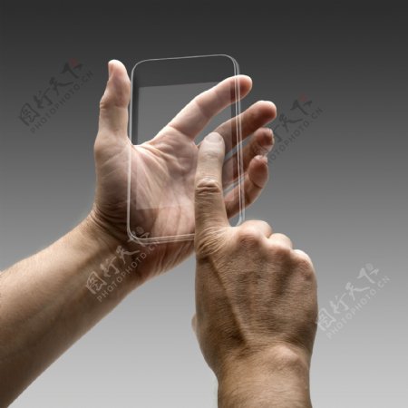 拿智能手机的手势图片