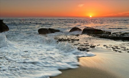日出和日落岸海浪石海大自然