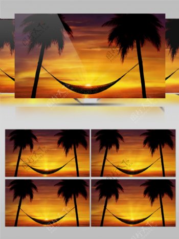 夕阳下沙滩椰树吊床视频素材