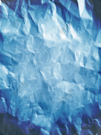 蓝色质感褶皱纸张背景