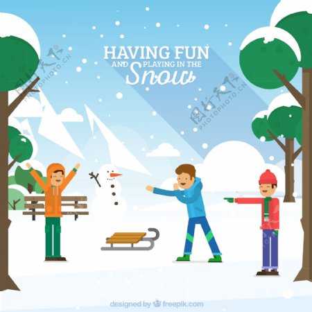 冬季雪地玩耍男孩和雪人