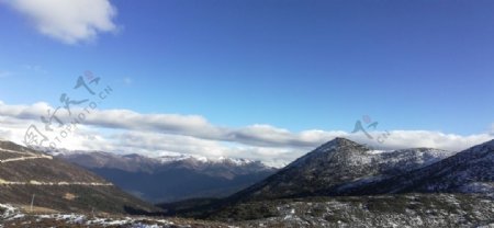 蓝天白云雪山风光图片